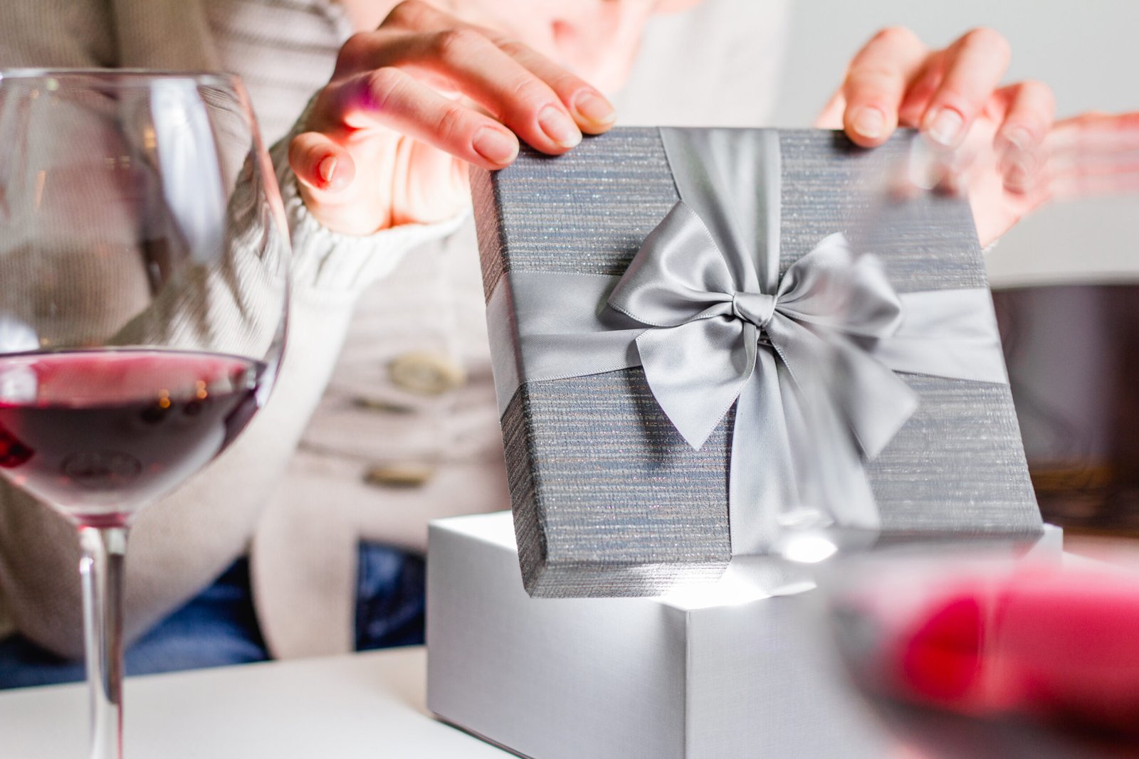 Woman opening a gift